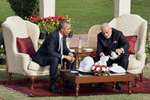 Prime Minister Narendra Modi pours tea for US President Barack Obama during their talks at Hyderabad House in New Delhi.